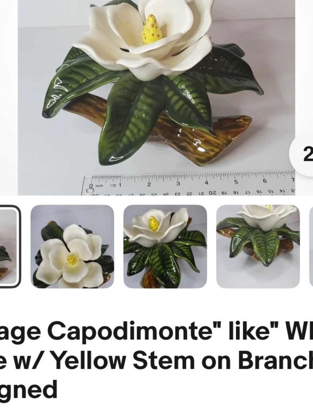 White Magnolia Ceramic Accent Sculpture with Green Leaves and Yellow Center
